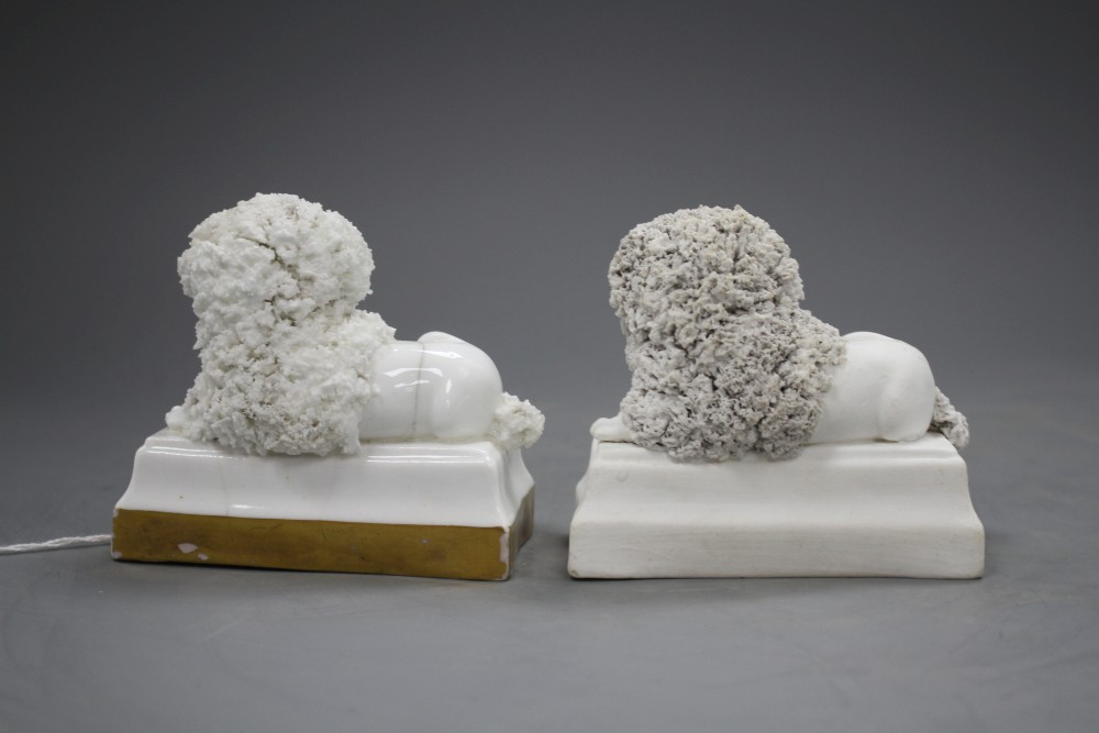 Two Staffordshire porcelain figures of recumbent poodles, c.1830-50, possibly Lloyd Shelton, L. 9.5cm